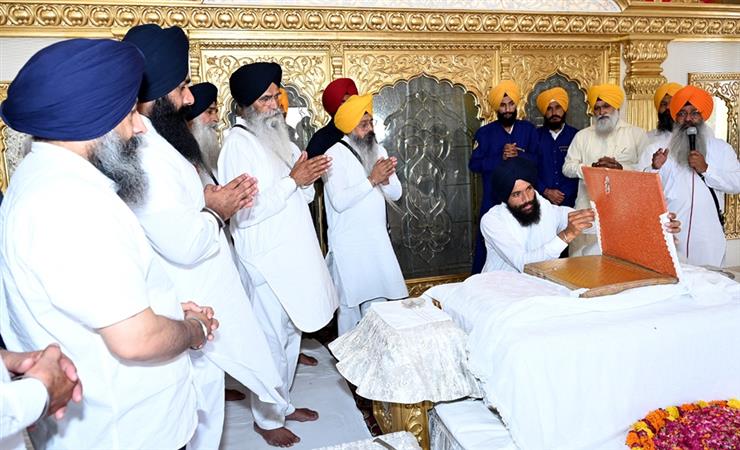 The holy Bir of Guru Granth Sahib, injured by bullet during the June 1984 army attack was decorated for the darshan