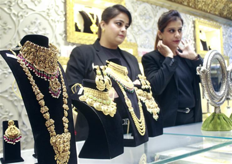 Gold prices in consolidation phase, upward trend ahead: Report
