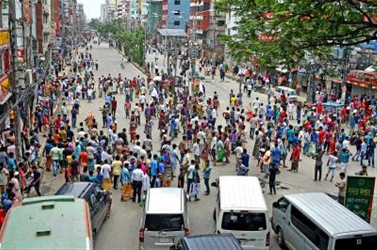 B'desh: One dead as workers, security forces clash over factory closure