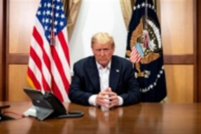 Trump says he will leave hospital Monday evening
