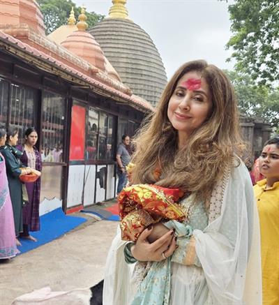 Urmila Matondkar offers prayers at the Kamakhya Temple amidst heavy rains